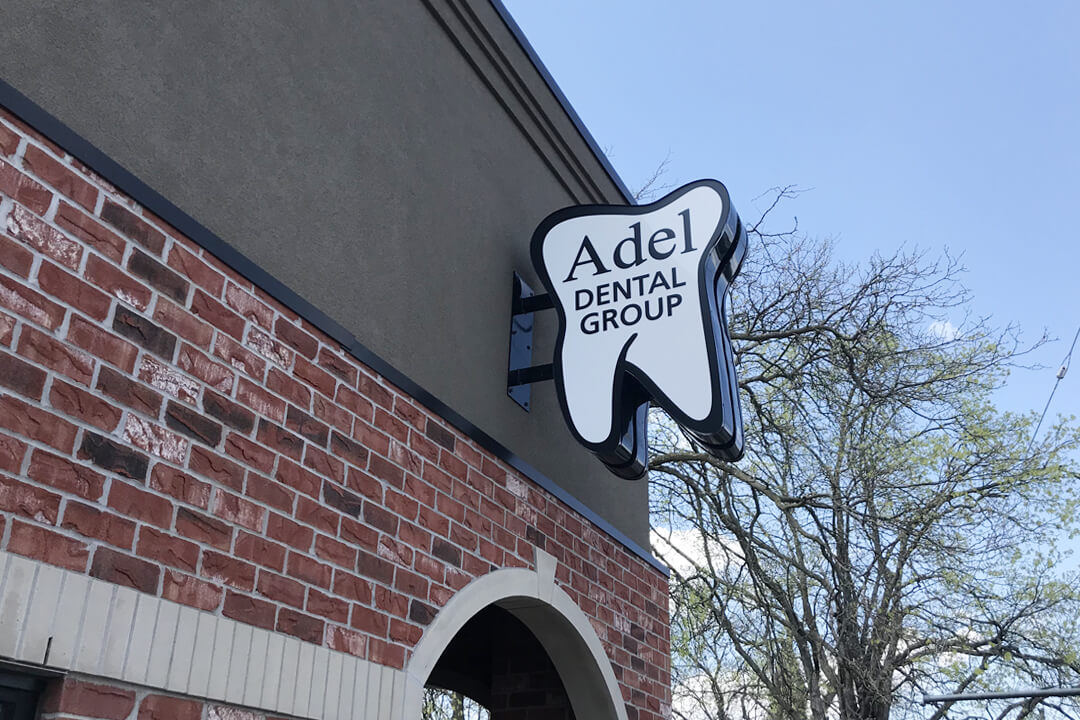 Projection Signs Adel Dental Group